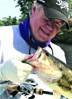 Phil Brannan holds a big bass caught on Falcon Lake in South Texas.