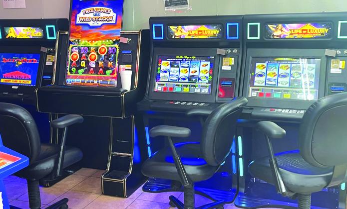 Game room interior showing slot machines