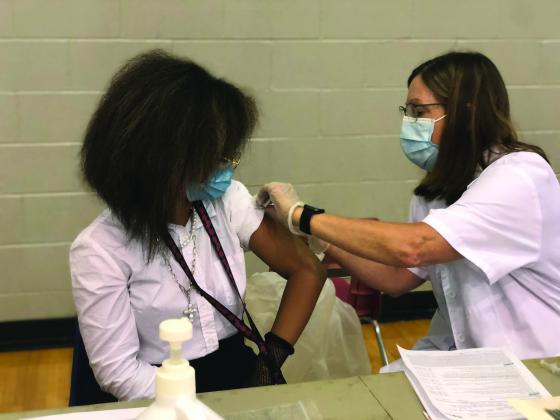 Child receiving a vaccine 