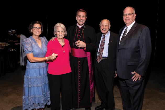 Connie Prewitt, Peggy Parigi, Bishop David Toups, Joe Parigi and Milt Prewitt