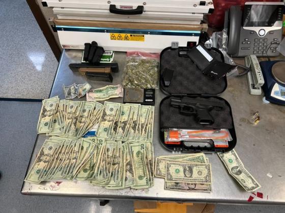 Paraphernalia including cash, a gun and marijuana 