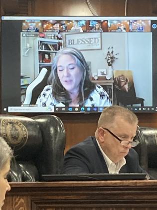 Pct. 1 Commissioner L.W. Cooper Jr. listens to Sheena Rodriguez as she speaks via Zoom to the Hardin County Commissioners Court on Aug. 23.