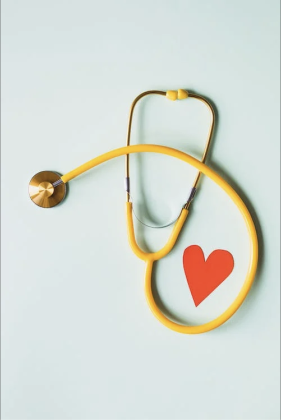 A stethoscope with a heart next to it 