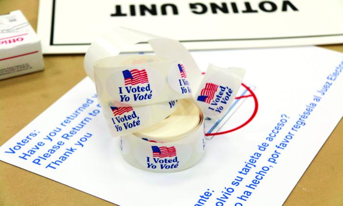 An image of voting stickers on a table 