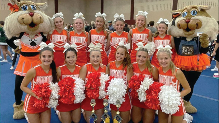 Orangefield High School varsity cheerleaders and mascots