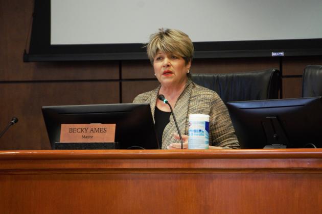 Beaumont Mayor Becky Ames speaks at the April 3 council meeting, with sanitizing wipes close.
