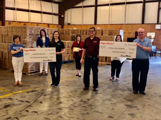 ExxonMobil donates checks to Beaumont charities.