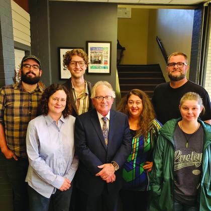 Don Dodd (center) and The Examiner editorial staff