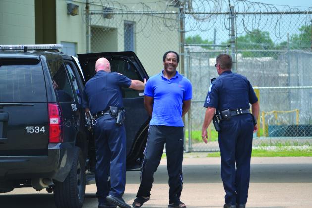Calvin Walker being arrested 