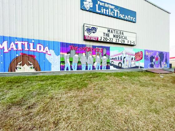 The newly painted murals on the exterior of Port Arthur Little Theatre.