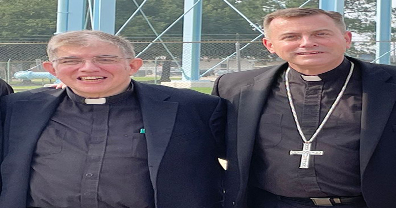 Father Steven McGrate and Bishop David Toups